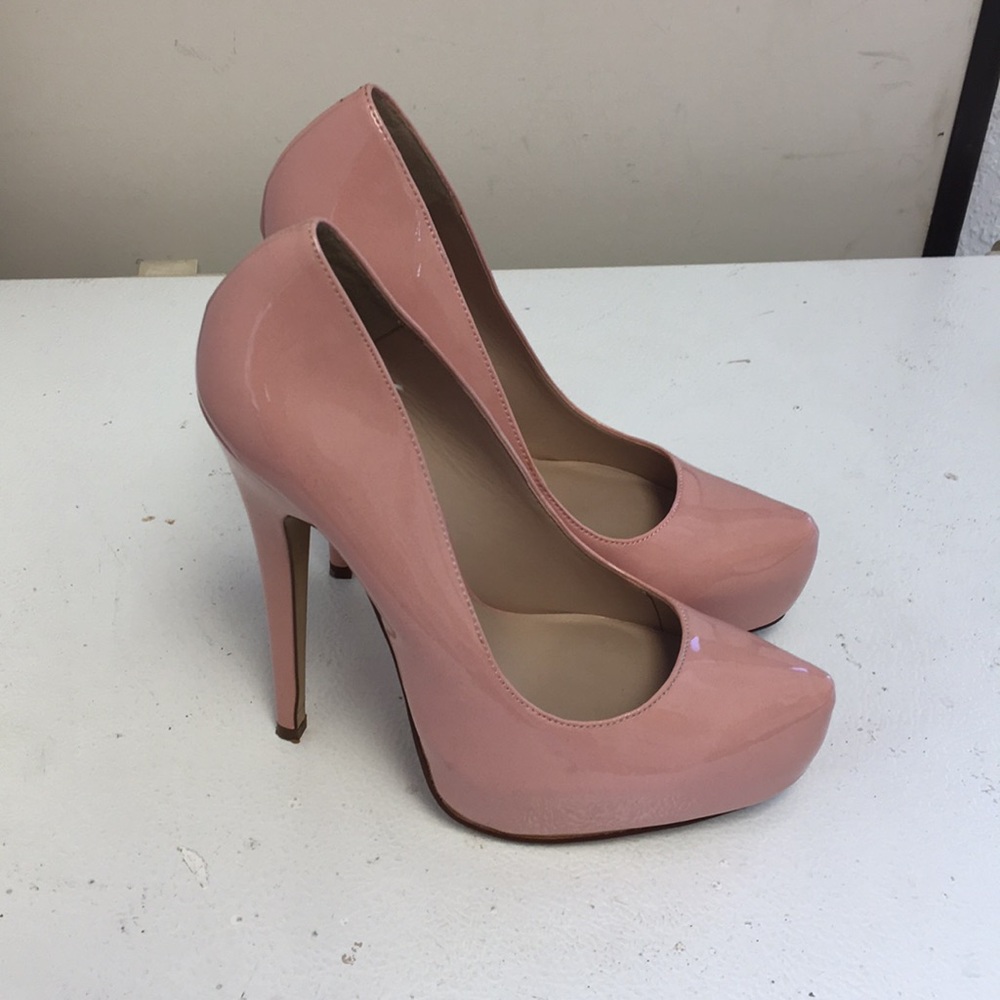 Blush pink platform pumps